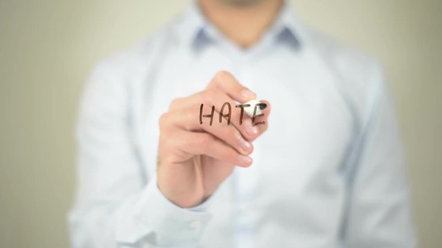 Hate Speech , man writing on transparent screen