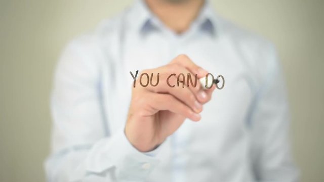 You Can Do Anything , man writing on transparent screen