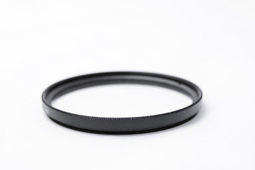 polarizing filter for the lens isolated on a white background