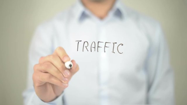 Traffic Analysis , man writing on transparent screen