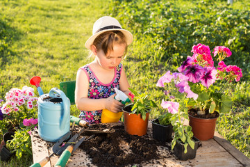  cute girl planting flowers