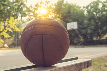 Basketball ball with de-focused field in the background.