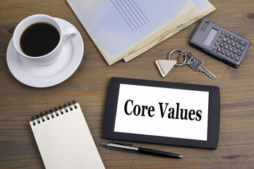 Core Values. Text on tablet device on a wooden table