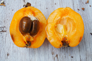 Loquat Medlar fruit on wooden  background