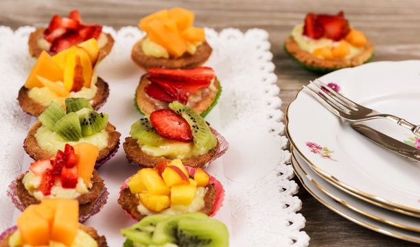 mini pastry with custard cream and fresh fruits and elegant plat