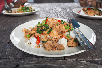 Basil Fried Rice on wood floor.