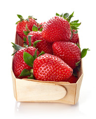 Strawberry in wooden container box isolated on white