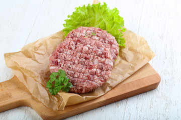 Raw burger cutlet