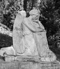 Old statue on grave