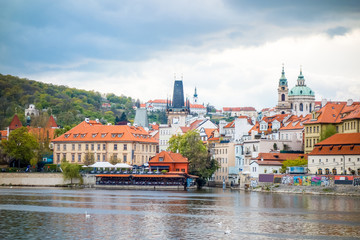 Fototapeta premium Old Town ancient architecture and river pier in Prague, Czech Re