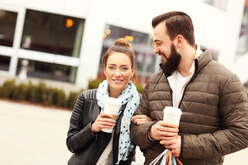 Young couple with shopping bags