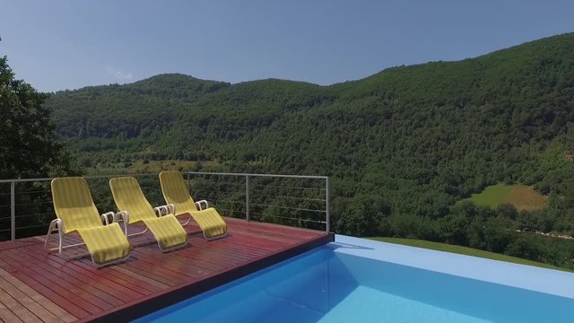 Infinity pool.Flying above the pool. Aerial view of the woods.Pool view. Swimming pool background.Aerial view of river Drina,Serbia