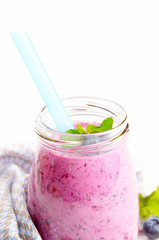 Blueberry shake on white table