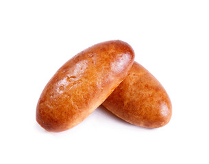 Fresh pies and buns with meat and vegetables isolated on white background. Pastries and bread in a bakery