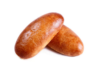 Fresh pies and buns with meat and vegetables isolated on white background. Pastries and bread in a bakery