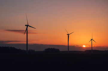 The image of windmill, sunset, energy