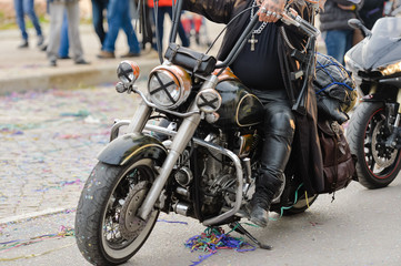 Fototapeta premium Quarteira, Portugal - February 2016: Cropped image of carnival parade in the city, Algarve, Portugal. Participants and crowd people.