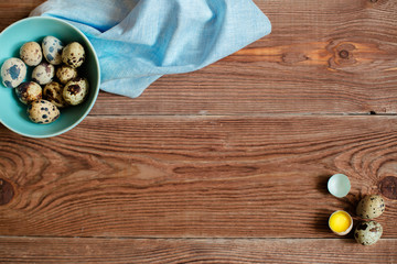 Wooden backgrond with quail eggs