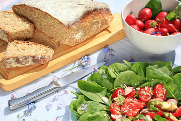 Fresh, home baked soda bread on wooden cutting board, close up