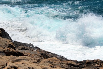 
Mediteranean Sea foam - wave hitting the shore