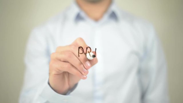 Price Tag   ,  man writing on transparent wall
