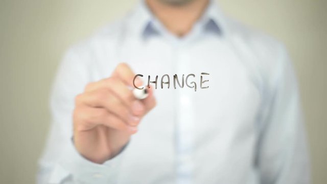 Change Management   ,  man writing on transparent wall