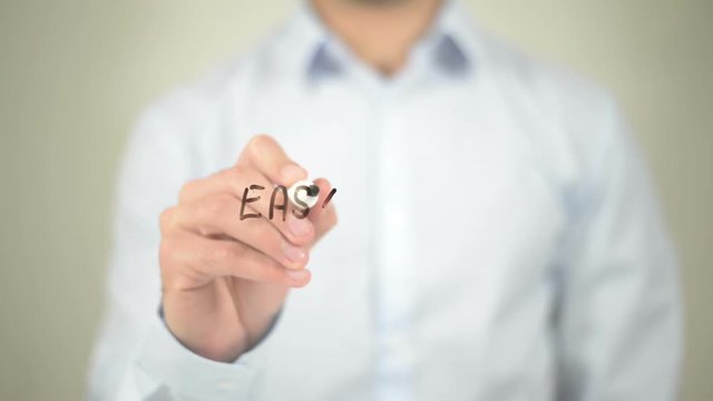 Easy To Use   ,  man writing on transparent wall