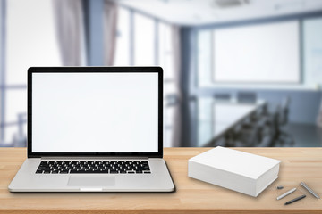 blank screen notebook and blank book with office background