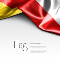 Fototapeta na wymiar Flag of South Ossetia on white background. Sample text.