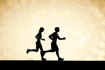 silhouette couple running together concept