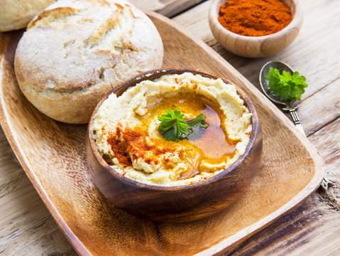 Hummus with olive oil and fresh bread