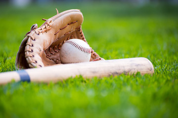 Baseball & Glove on Baseball Field