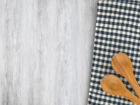 wooden spoon on wood background
