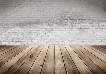 Wood table with White brick wall background
