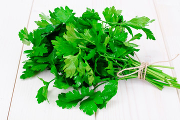 Fresh Parsley on a Wooden Boards