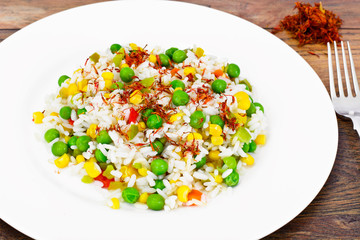 Rice with Corn, Peas, Peppers and Saffron
