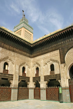 Courtyard and minaret of the Madrasa Bou Inania in Fez, Morocco