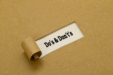 Do's and Don't's Message written under torn paper.
