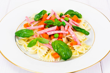 Pasta Bow with Diced Carrots, Salami and Green Peas