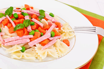 Pasta Bow with Diced Carrots, Salami and Green Peas