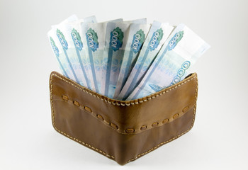 Wallet with Russian rubles on a white background