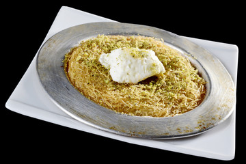 Kanafah is a Levantine cheese pastry soaked in sweet, sugar-based syrup, typical of the regions belonging to the former Ottoman Empire