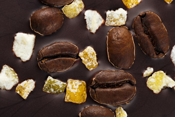 Dark chocolate with coffee grains and fruits.