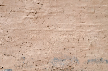Texture of old rustic wall covered with brown stucco, background, texture series