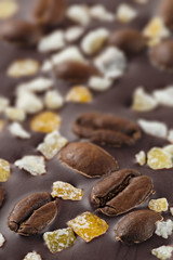 Dark chocolate with coffee grains and fruits. 
