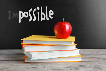 Word impossible transformed into possible on blackboard and textbooks
