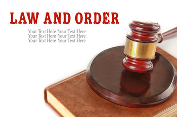 Gavel and book isolated on white. Law and order concept