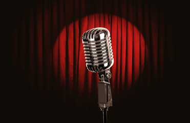 Retro silver microphone on red curtain background