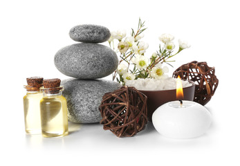 Spa still life with pebbles and candle isolated on white