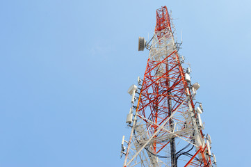 Telecommunication tower with blue sky - 111892867